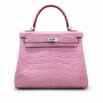 Authentic Hermès Kelly pink crocodile leather handbag with structured top handle and silver hardware