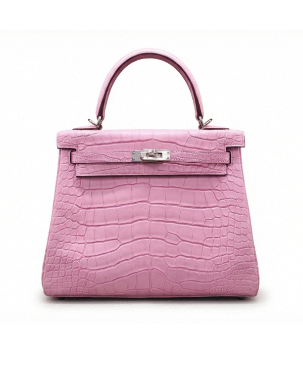 Authentic Hermès Kelly pink crocodile leather handbag with structured top handle and silver hardware