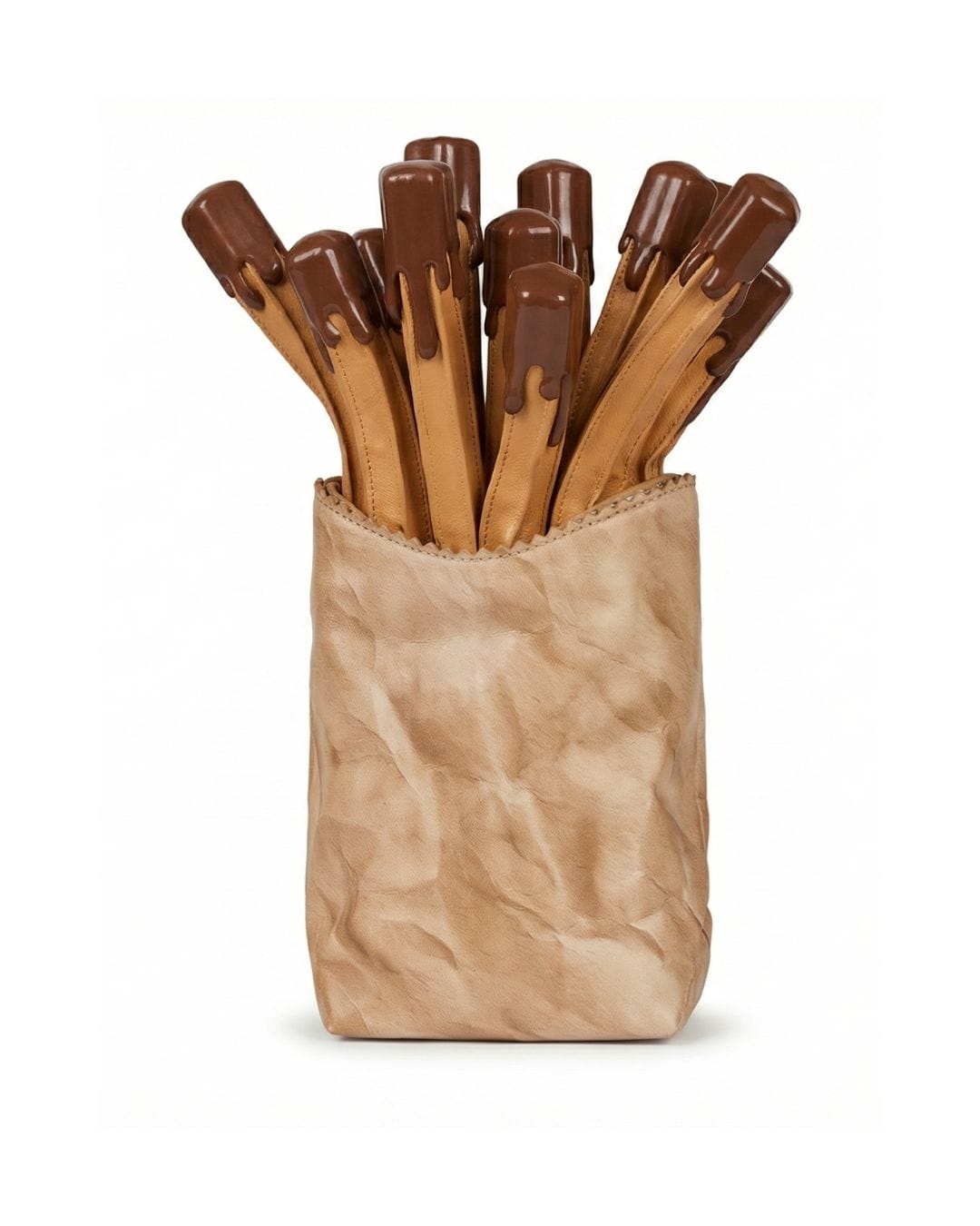 Moschino Runway Fall Winter 2026 French fries shaped bag in sculptural leather with novelty drip detailing